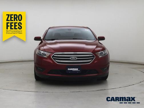 Red 2015 Ford Taurus SEL