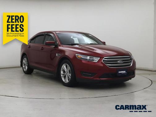 Red 2015 Ford Taurus SEL