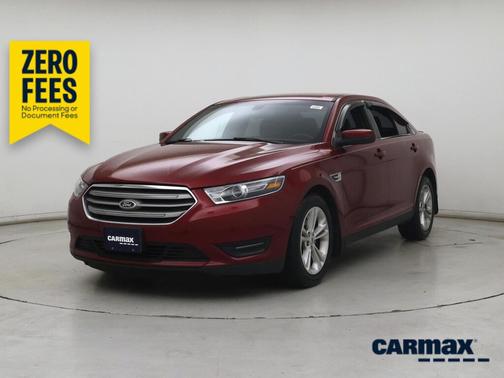 Red 2015 Ford Taurus SEL