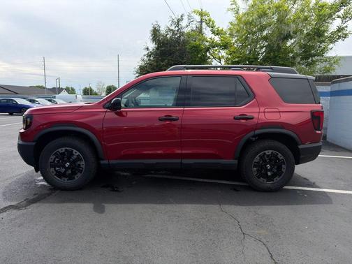 Radiant Red Metallic II 2026 Honda Passport TrailSport Elite