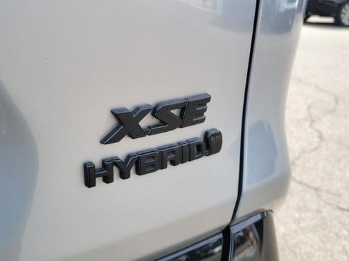 Silver Sky Metallic/Midnight Black Metallic 2024 Toyota RAV4 Hybrid SE
