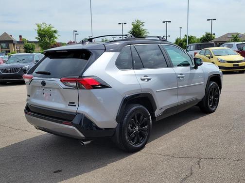 Silver Sky Metallic/Midnight Black Metallic 2024 Toyota RAV4 Hybrid SE