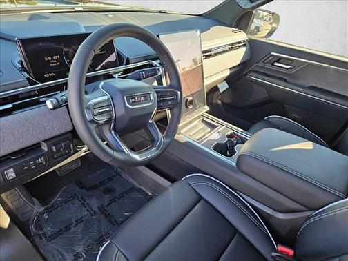 Deep Bronze Metallic 2026 GMC Sierra EV Standard Range Elevation
