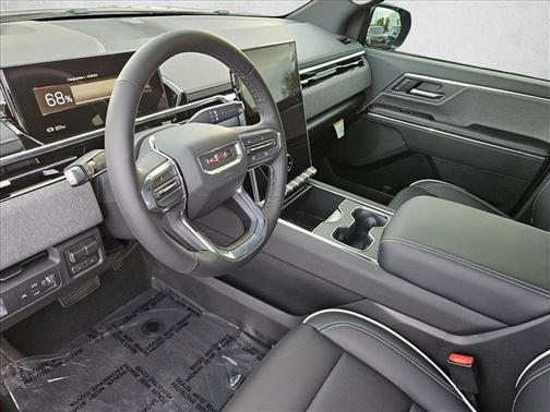 Deep Bronze Metallic 2026 GMC Sierra EV Standard Range Elevation