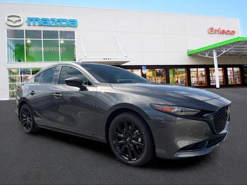 Machine Gray Metallic 2026 Mazda Mazda3 AWD w/Premium Package