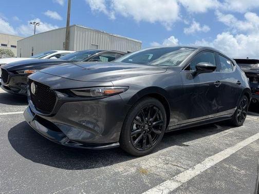 Machine Gray Metallic 2026 Mazda Mazda3 AWD w/Premium Package