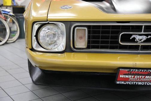 Gold 1973 Ford Mustang