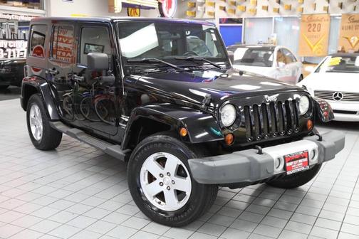 Black 2011 Jeep Wrangler Unlimited Sahara
