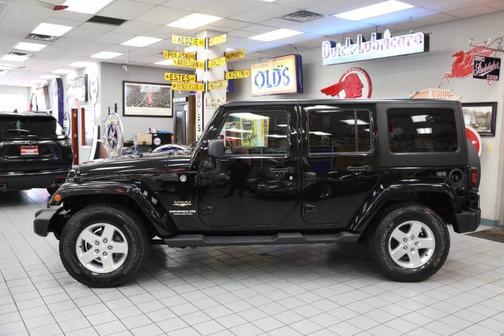 Black 2012 Jeep Wrangler Unlimited Sahara