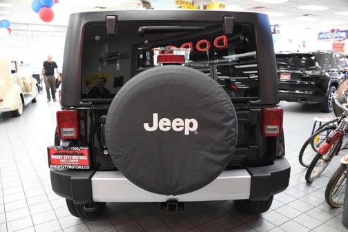 Black 2012 Jeep Wrangler Unlimited Sahara