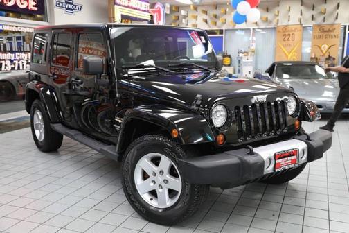 Black 2012 Jeep Wrangler Unlimited Sahara
