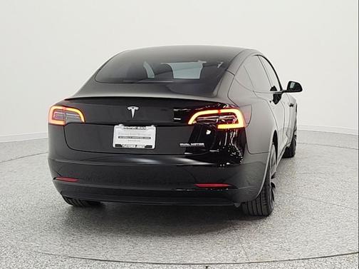 Solid Black 2023 Tesla Model 3 Performance
