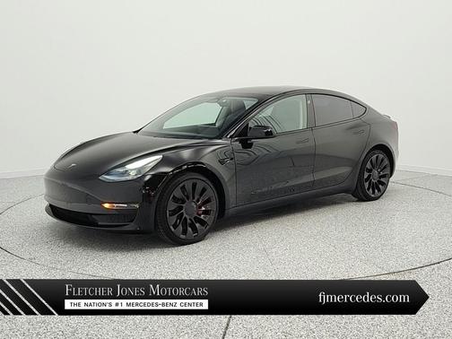 Solid Black 2023 Tesla Model 3 Performance
