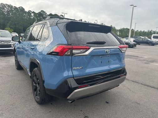 Cavalry Blue/Midnight Black Metallic 2023 Toyota RAV4 Hybrid SE