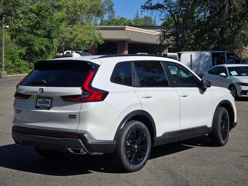 Platinum White Pearl 2026 Honda CR-V Hybrid Sport Touring AWD