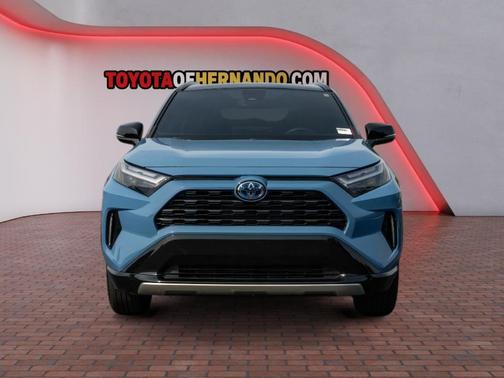 Cavalry Blue/Midnight Black Metallic 2024 Toyota RAV4 Hybrid SE