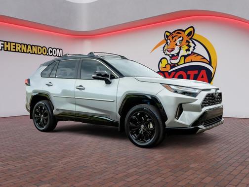Silver Sky Metallic/Midnight Black Metallic 2024 Toyota RAV4 Hybrid SE