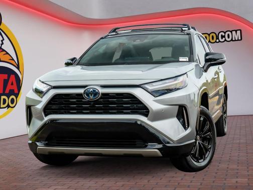 Silver Sky Metallic/Midnight Black Metallic 2024 Toyota RAV4 Hybrid SE