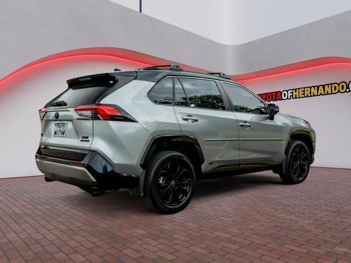 Silver Sky Metallic/Midnight Black Metallic 2024 Toyota RAV4 Hybrid SE