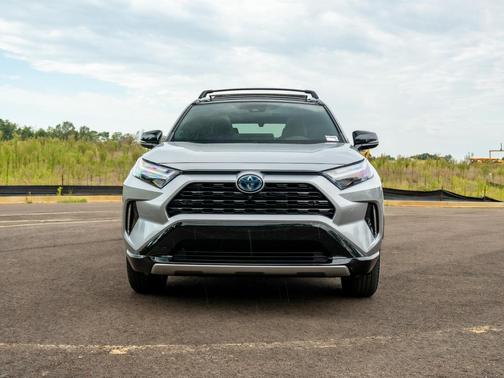 Silver Sky Metallic/Midnight Black Metallic 2024 Toyota RAV4 Hybrid SE