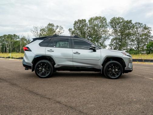 Silver Sky Metallic/Midnight Black Metallic 2024 Toyota RAV4 Hybrid SE