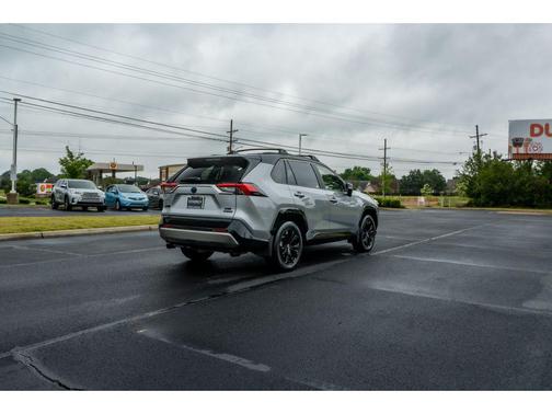 Silver Sky Metallic/Midnight Black Metallic 2024 Toyota RAV4 Hybrid SE