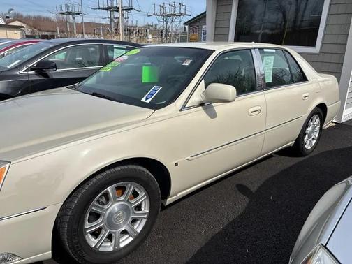 Tan 2010 Cadillac DTS Base
