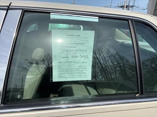 Tan 2010 Cadillac DTS Base