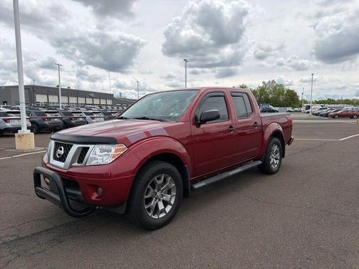 Red 2021 Nissan Frontier SV