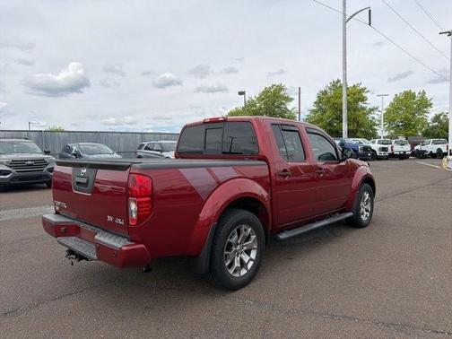 Red 2021 Nissan Frontier SV