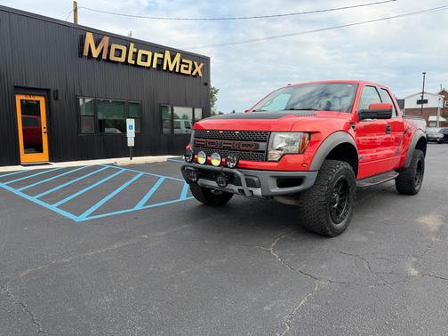 Molten Orange Metallic Tri-Coat 2011 Ford F-150 SVT Raptor Truck