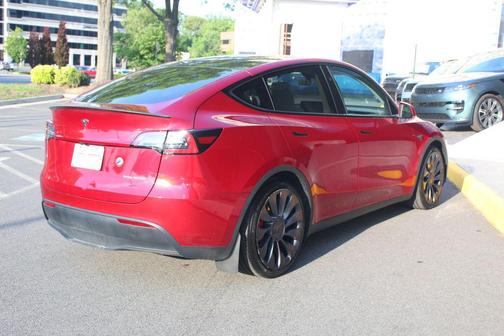 Ultra Red 2025 Tesla Model Y Performance Dual Motor All-Wheel Drive