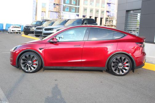 Ultra Red 2025 Tesla Model Y Performance Dual Motor All-Wheel Drive
