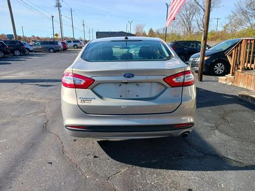 Ruby Red Tinted Clearcoat 2015 Ford Fusion SE