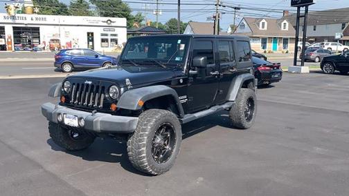 Photo 1 of 31 of 2012 Jeep Wrangler Unlimited Sport