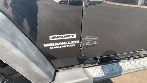 Photo 5 of 31 of 2012 Jeep Wrangler Unlimited Sport