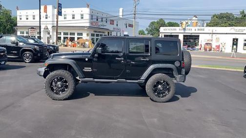 Photo 3 of 31 of 2012 Jeep Wrangler Unlimited Sport