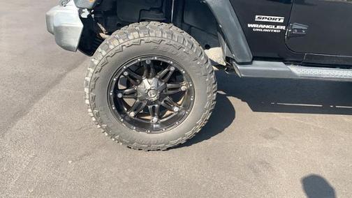Photo 4 of 31 of 2012 Jeep Wrangler Unlimited Sport