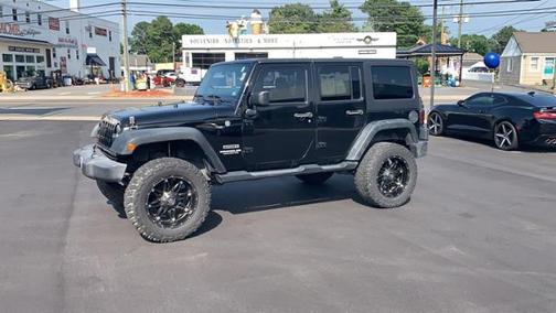Photo 2 of 31 of 2012 Jeep Wrangler Unlimited Sport