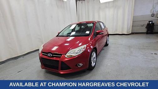 Red 2012 Ford Focus SE