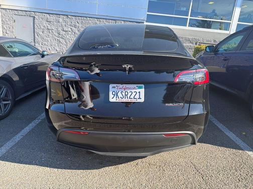 Solid Black 2023 Tesla Model Y Performance Dual Motor All-Wheel Drive