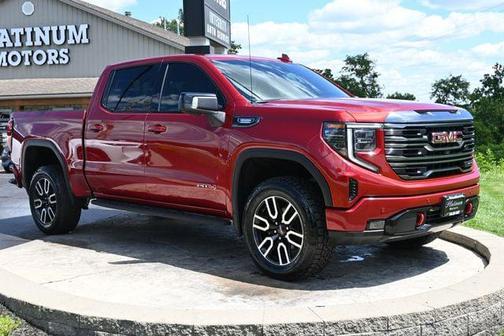 Volcanic Red Tintcoat 2024 GMC Sierra 1500 AT4
