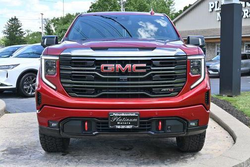 Volcanic Red Tintcoat 2024 GMC Sierra 1500 AT4