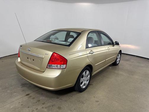 Champagne Gold 2009 Kia Spectra EX