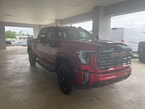 Volcanic Red Tintcoat 2024 GMC Sierra 2500 AT4