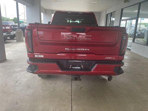 Volcanic Red Tintcoat 2024 GMC Sierra 2500 AT4