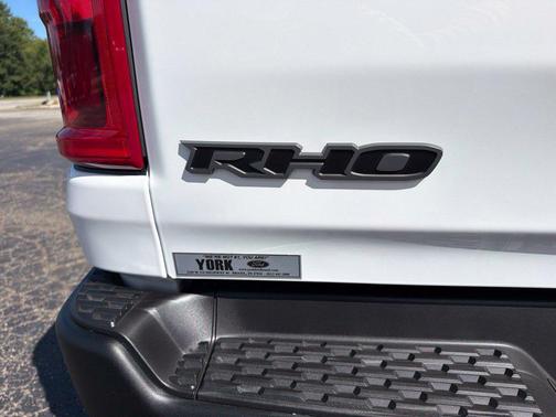 Bright White Clearcoat 2026 RAM 1500 RHO Crew Cab 4x4 5'7' Box