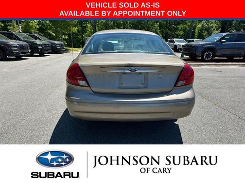 Arizona Beige Clearcoat 2003 Ford Taurus SES