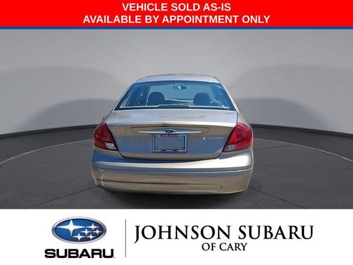 Arizona Beige Clearcoat 2003 Ford Taurus SES
