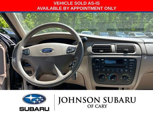 Arizona Beige Clearcoat 2003 Ford Taurus SES